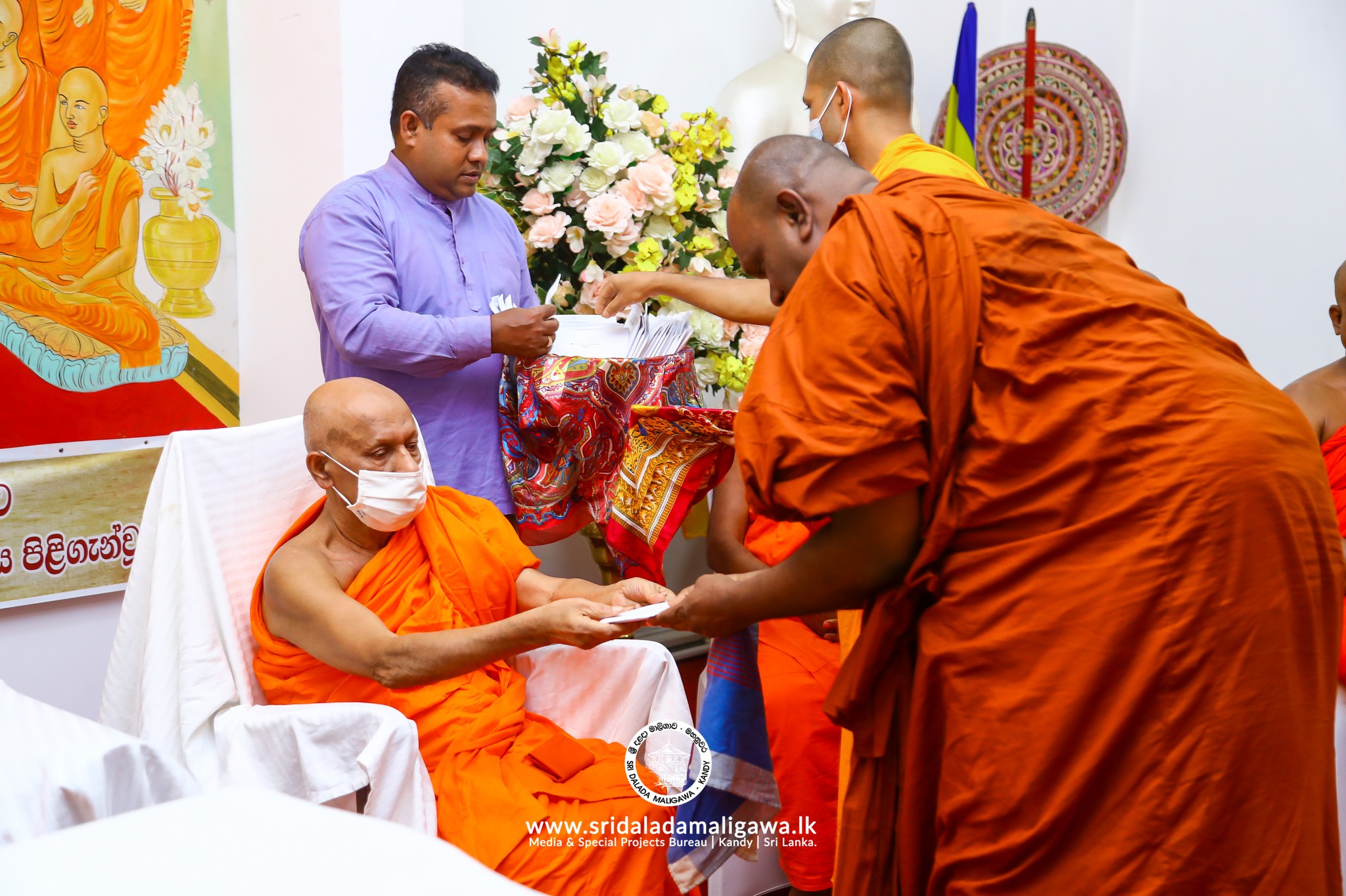 Present Financial Aid to 50 Temples Located in Different Parts of the Island 04